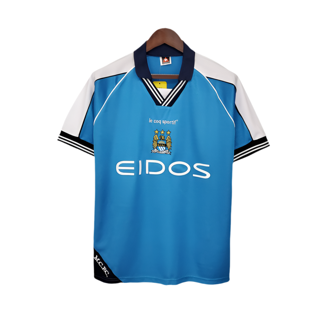 26BEFD8A-486D-4BD5-B195-C748C4251A24.png Jersey Manchester City Retro 1999/2001 Blue - Image 1