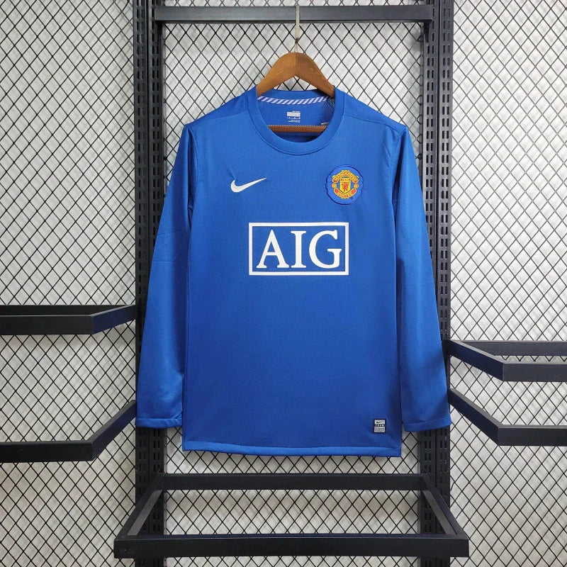camisa-manchester-united-retro-ii-away-manga-longa-0708-azul-cr7-cristiano-ronaldo-2-844a061c28eaec0f1317162914446212-1024-1024.jpg Manchester United Retro 2008/2009 Third Kit Long Sleeve - Image 1