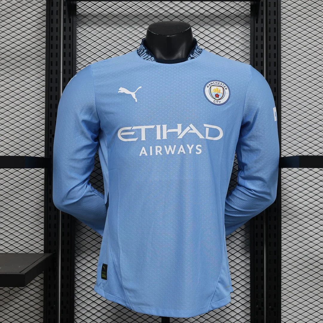 ffb086d4d9143be737cbf35b553185da.jpg 2024/2025 Manchester City Long Sleeve Home Kit - Image 1